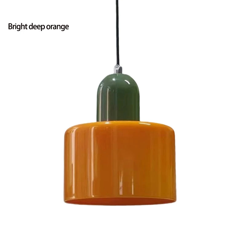 Bright orange Mira glass pendant with a dark green top