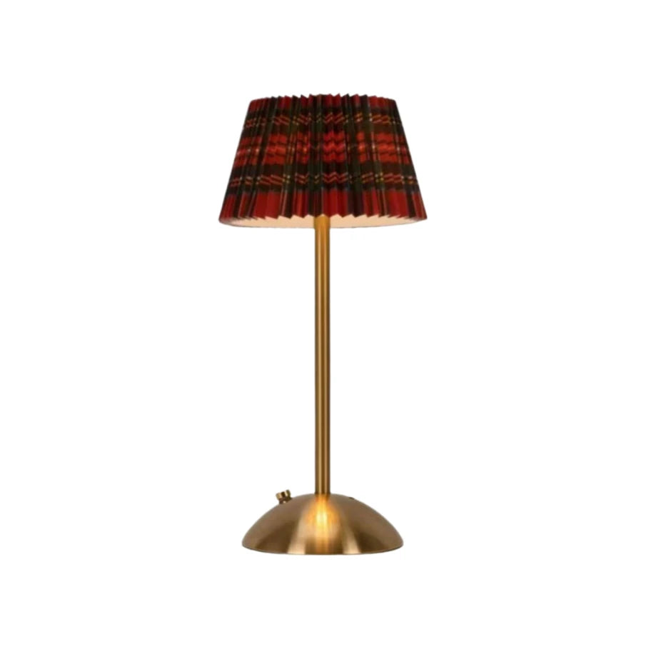 Elara cordless lamp with a red tartan pleated shade on white