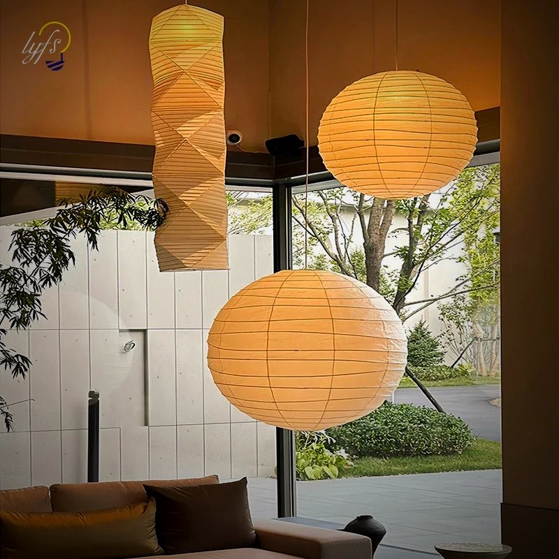 Two Kumo pendants over a lounge