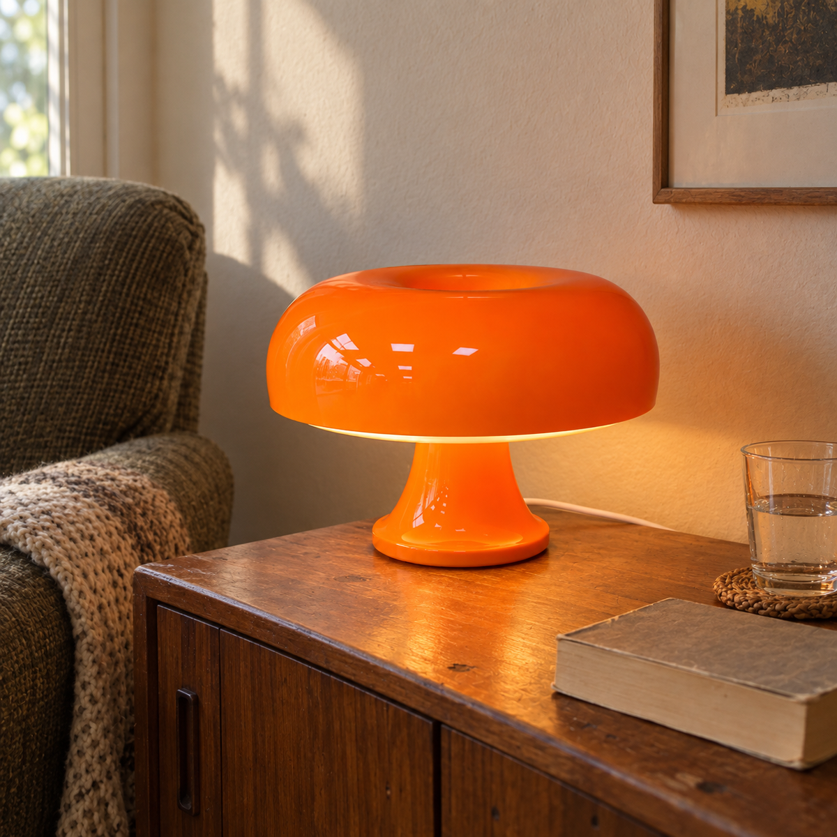 Orange Oslo mushroom lamp in a lived-in reading corner